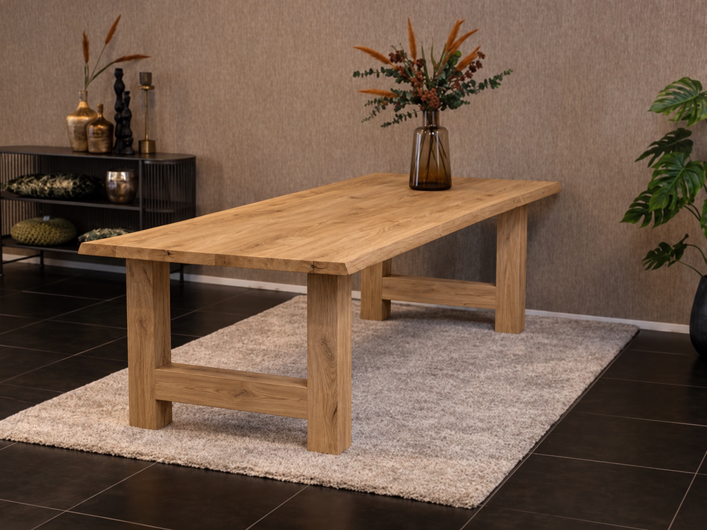 Massief eiken eettafel met boomschorsrand met houten H-poot