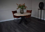 Massief eiken ronde eettafel met stalen spin-poot